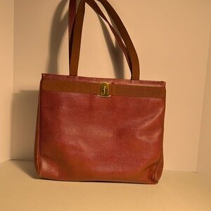Salvortia Ferrogama tote or shoulder bag. Can be worn to compliment any outfit